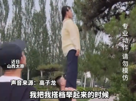 无人机挂在了树上 杂技演员帮忙拿下 这也太霸气了